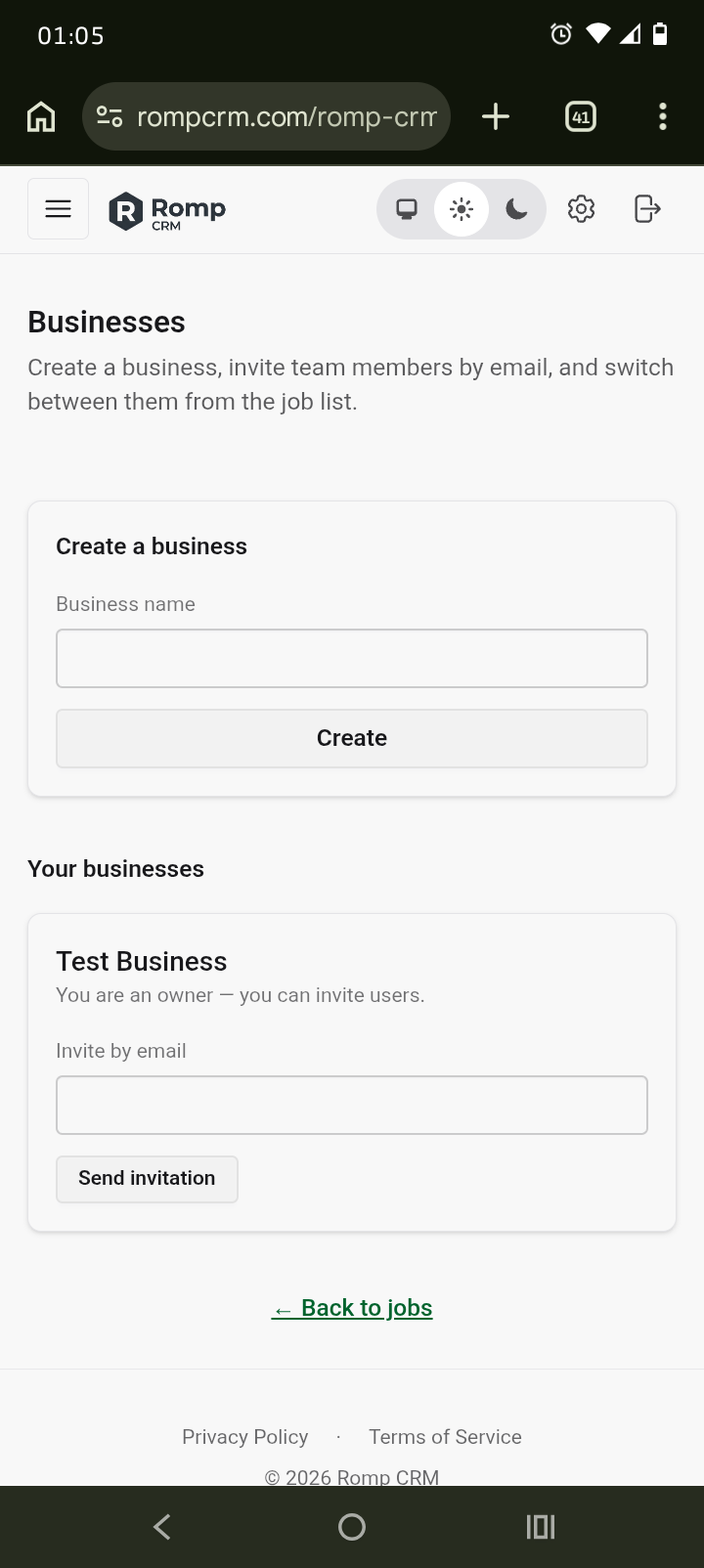 Mobile screenshot of the Romp CRM Businesses page for creating businesses, inviting team members by email, and switching between workspaces.